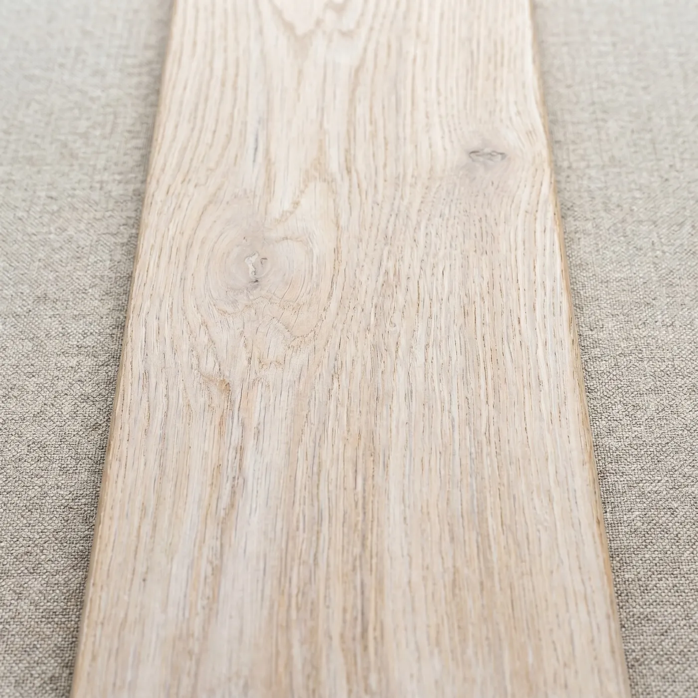 Lime-washed oak finish — pale calm